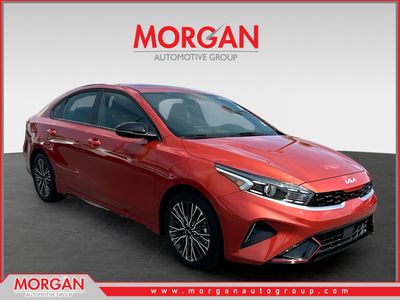 2024 Kia Forte GT-Line in Red — front three-quarter view