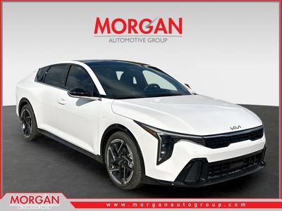 2026 Kia K4 GT-Line in Snow White Pearl — front three-quarter view