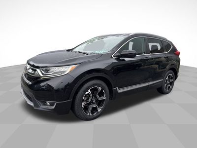 2019 Honda CR-V Touring in Black — front three-quarter view