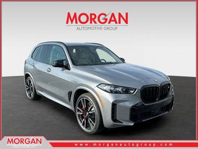 2026 BMW X5 M60i in Gray — front three-quarter view