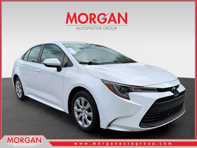 2024 Toyota Corolla LE in White — front three-quarter view