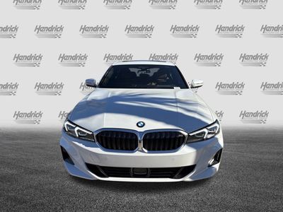2026 BMW 3 Series 330i xDrive — rear three-quarter view