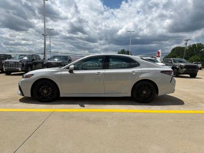 2022 Toyota Camry Hybrid — rear three-quarter view