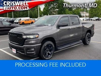 2025 RAM 1500 Tradesman Crew Cab 4x4 5'7' Box in Granite Crystal Metallic Clearcoat — front three-quarter view