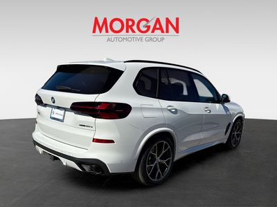 2026 BMW X5 — rear three-quarter view