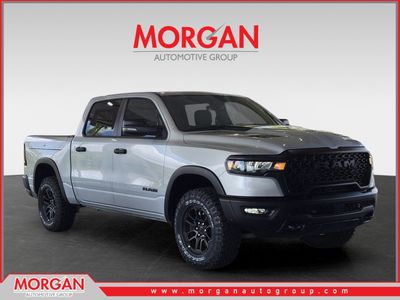 2026 Ram 1500 Rebel in Silver Zynith — front three-quarter view