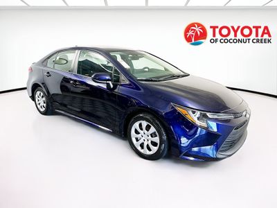 2024 Toyota Corolla LE in Blueprint — front three-quarter view