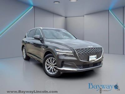 2024 Genesis GV80 2.5T in Makalu Gray — front three-quarter view