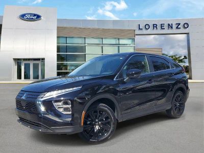 2024 Mitsubishi Eclipse Cross LE in Labrador Black Pearl — front three-quarter view