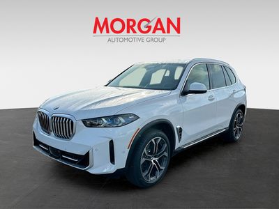 2026 BMW X5 — rear three-quarter view