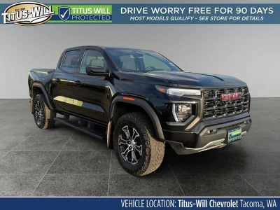 2023 GMC Canyon AT4 in Onyx Black — front three-quarter view