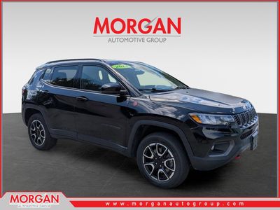 2024 Jeep Compass Trailhawk in Diamond Black Crystal Pearlcoat — front three-quarter view