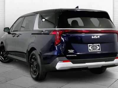 2026 Kia Carnival — rear three-quarter view