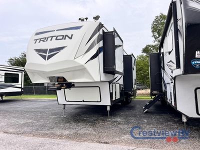 2020 Dutchmen RV Triton — rear three-quarter view