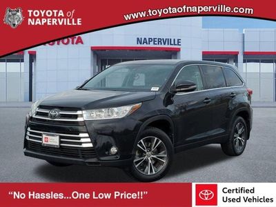 2019 Toyota Highlander LE Plus — front three-quarter view