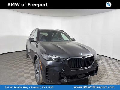 2026 BMW X5 xDrive40i xDrive40i in Black Sapphire Metallic — front three-quarter view