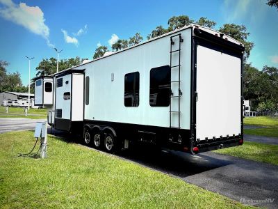 2021 Grand Design Momentum — rear three-quarter view