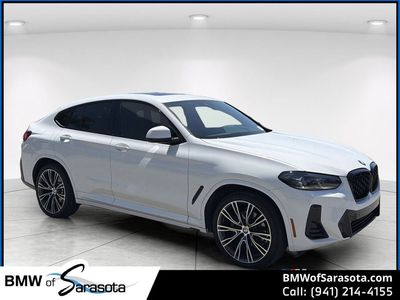2022 BMW X4 xDrive30i in White — front three-quarter view