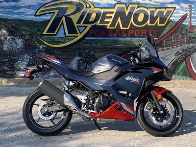 2026 Kawasaki Ninja 500 ABS Metallic Matte Twilight Blue in METALLIC MATTE TWILIGHT BLUE/CANDY PERSIMMON RED — front three-quarter view