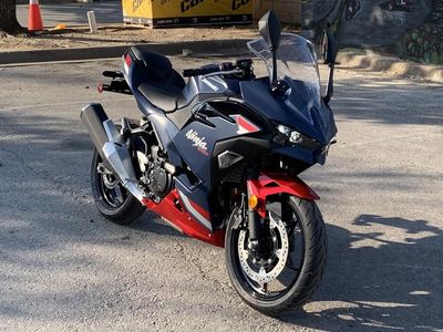2026 Kawasaki Ninja 500 ABS Metallic Matte Twilight Blue — side profile view