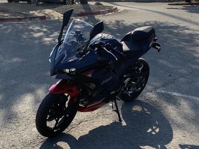 2026 Kawasaki Ninja 500 ABS Metallic Matte Twilight Blue — rear three-quarter view