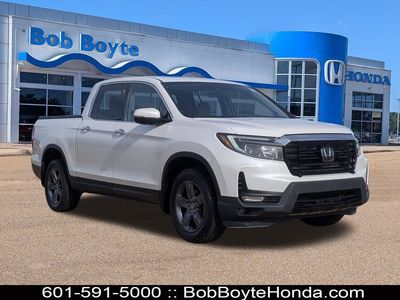 2023 Honda Ridgeline RTL-E in Platinum White Pearl — front three-quarter view
