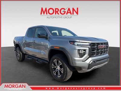2024 GMC Canyon 4WD AT4 in Sterling Metallic — front three-quarter view