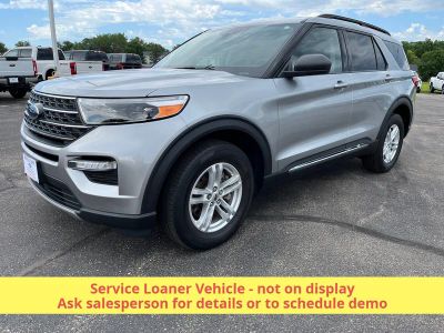 2023 Ford Explorer XLT 4WD in Iconic Silver Metallic — front three-quarter view