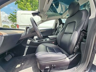 2023 Tesla Model 3 — side profile view