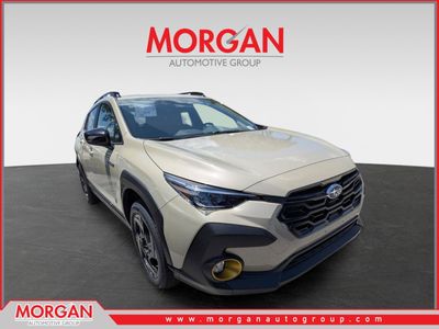 2026 Subaru Crosstrek Sport Hybrid in Sand Dune Pearl — front three-quarter view