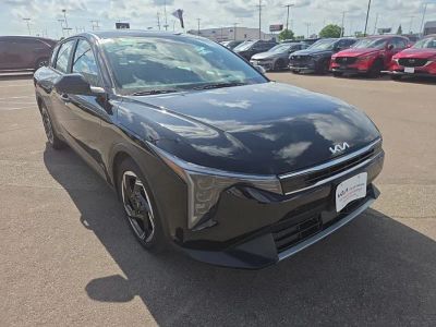 2025 Kia K4 — rear three-quarter view