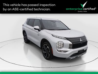 2024 Mitsubishi Outlander Plug-In Hybrid SE S-AWC — front three-quarter view