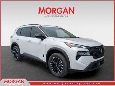 2026 Nissan Rogue Dark Armor in White — front three-quarter view