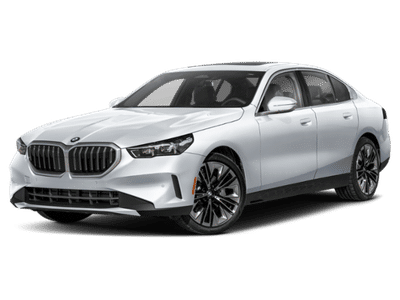 2026 BMW 5 Series 530i xDrive in Mineral White Metallic — front three-quarter view