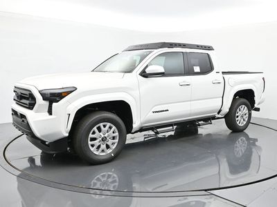 2025 Toyota Tacoma SR5 in Ice Cap — front three-quarter view