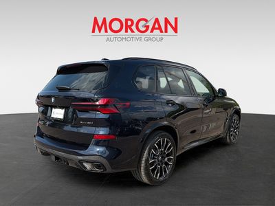 2026 BMW X5 — rear three-quarter view