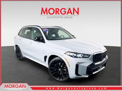 2024 BMW X5 M60i in Gray — front three-quarter view
