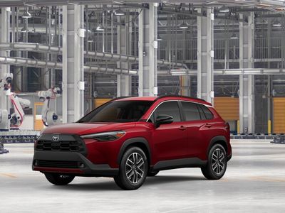 2026 Toyota Corolla Cross XLE in Soul Red Crystal — front three-quarter view