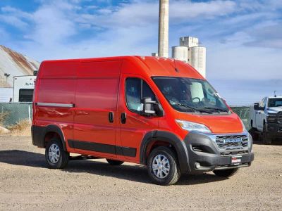 2025 RAM Promaster RAM PROMASTER 1500 SLT CARGO VAN HIGH ROOF 136' WB in Spitfire Orange Clear-Coat Exterior Paint — front three-quarter...