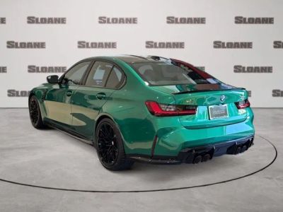 2027 BMW M3 — rear three-quarter view