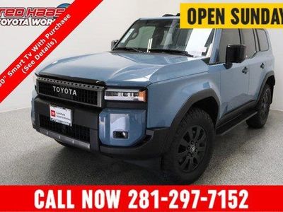 2026 Toyota Land Cruiser 4WD 2.4T /Electric in Heritage Blue — front three-quarter view