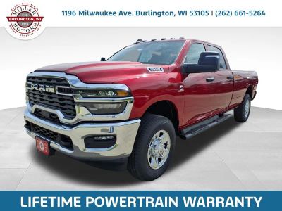 2026 RAM Ram 3500 RAM 3500 TRADESMAN CREW CAB 4X4 8' BOX in Molten Red Pearl-Coat Exterior Paint — front three-quarter view