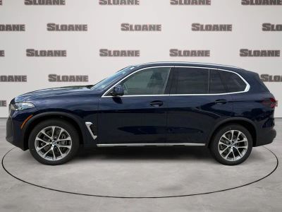 2026 BMW X5 — side profile view