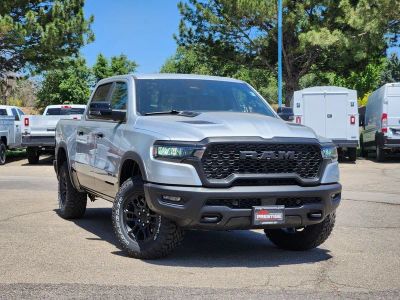 2026 RAM 1500 RAM 1500 REBEL CREW CAB 4X4 5'7' BOX in Silver Zynith Exterior Paint — front three-quarter view