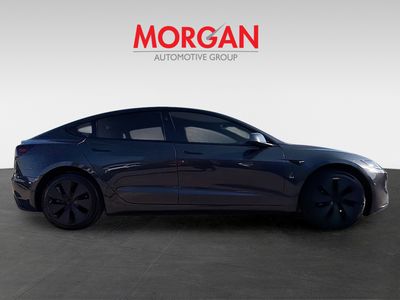 2025 Tesla Model 3 — side profile view
