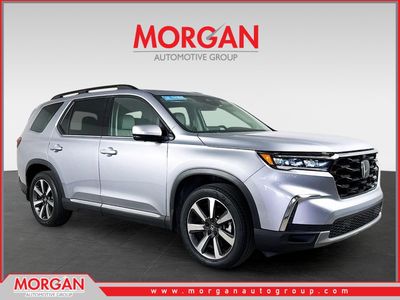 2023 Honda Pilot Elite in Silver — front three-quarter view