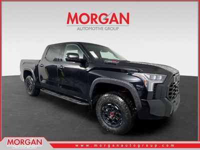 2026 Toyota Tundra 4WD TRD Pro Hybrid in Midnight Black Metallic — front three-quarter view