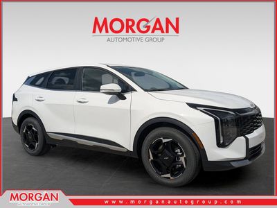 2026 Kia Sportage EX in Glacial White Pearl — front three-quarter view