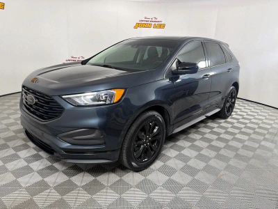 2022 Ford Edge SE in Stone Blue Metallic — front three-quarter view