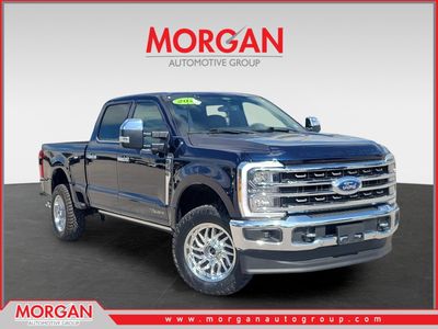 2024 Ford Super Duty F-350 SRW King Ranch in Blue Metallic — front three-quarter view